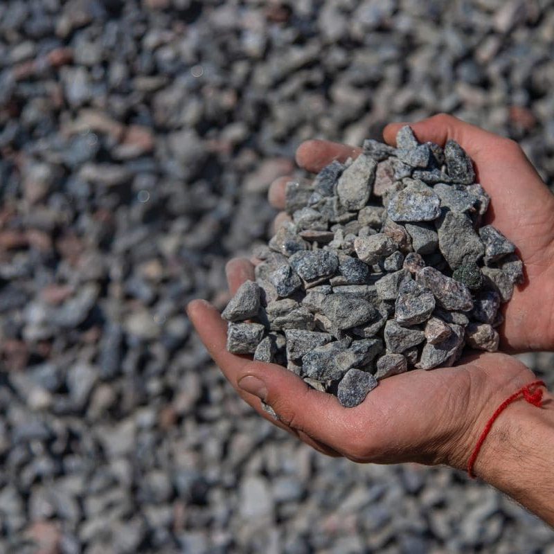 crushed-stones-in-the-hands-of-a-man-selective-fo-2023-11-27-05-05-21-utc-qvaluiioy2h2t3cg1fg63bj1fzsdn1bzbashpysq4g